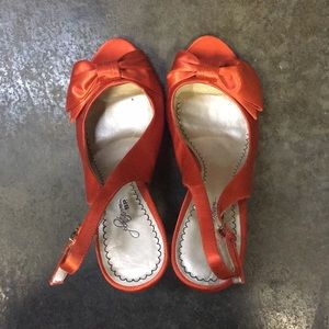 orange satin pumps